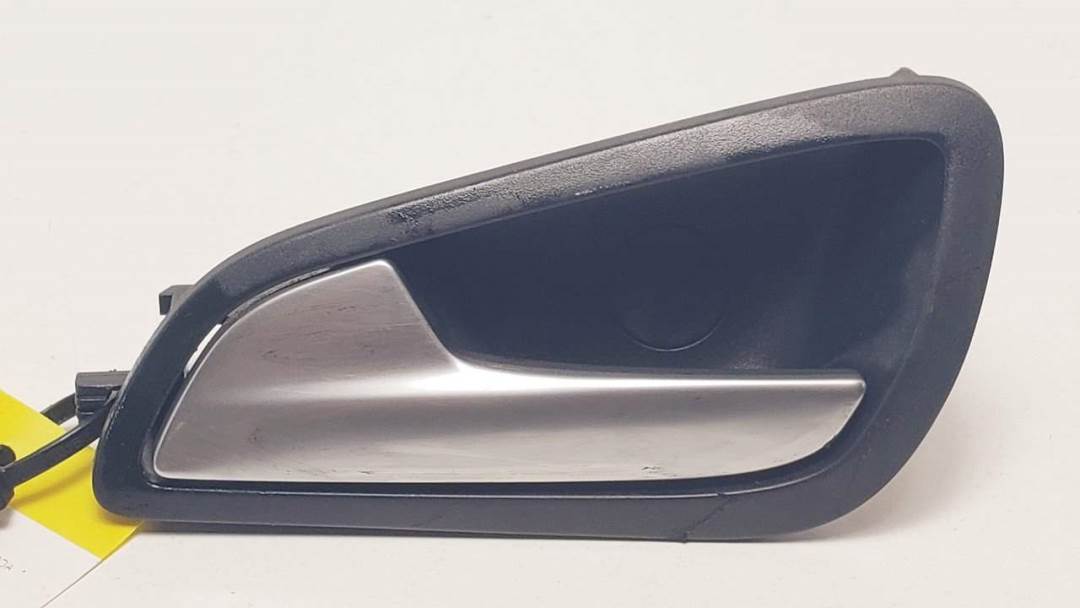 #1180148 MANETA INTERIOR DELANTERA IZQUIERDA