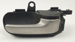 #1375006 MANETA INTERIOR DELANTERA DERECHA