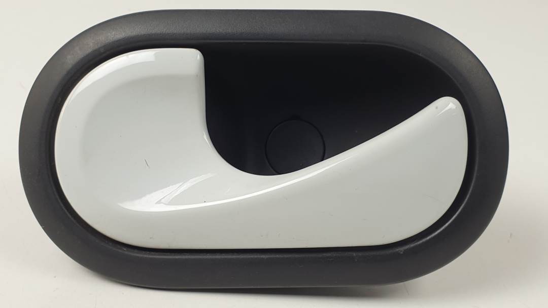 #1395873 MANETA INTERIOR DELANTERA IZQUIERDA