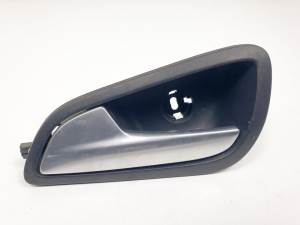 #916535 MANETA INTERIOR DELANTERA IZQUIERDA